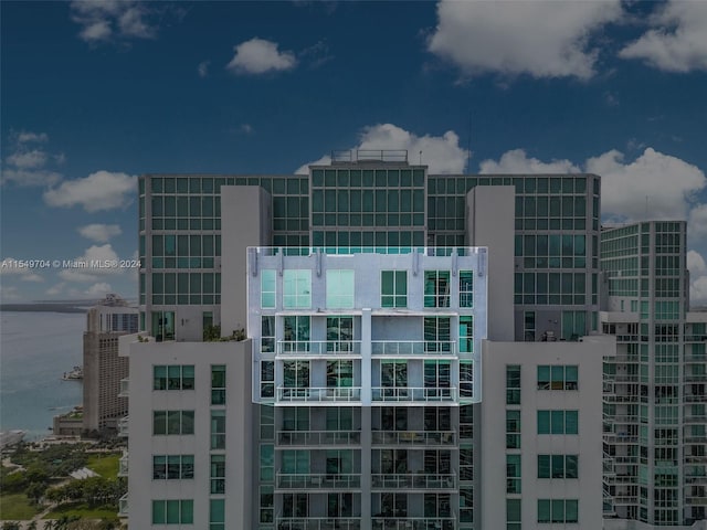 view of building exterior with a water view