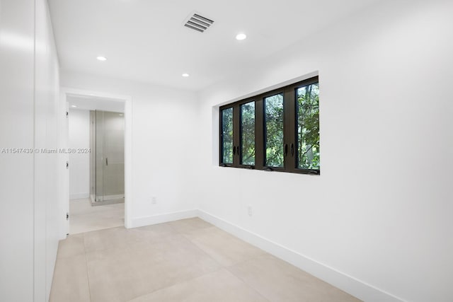 view of tiled spare room