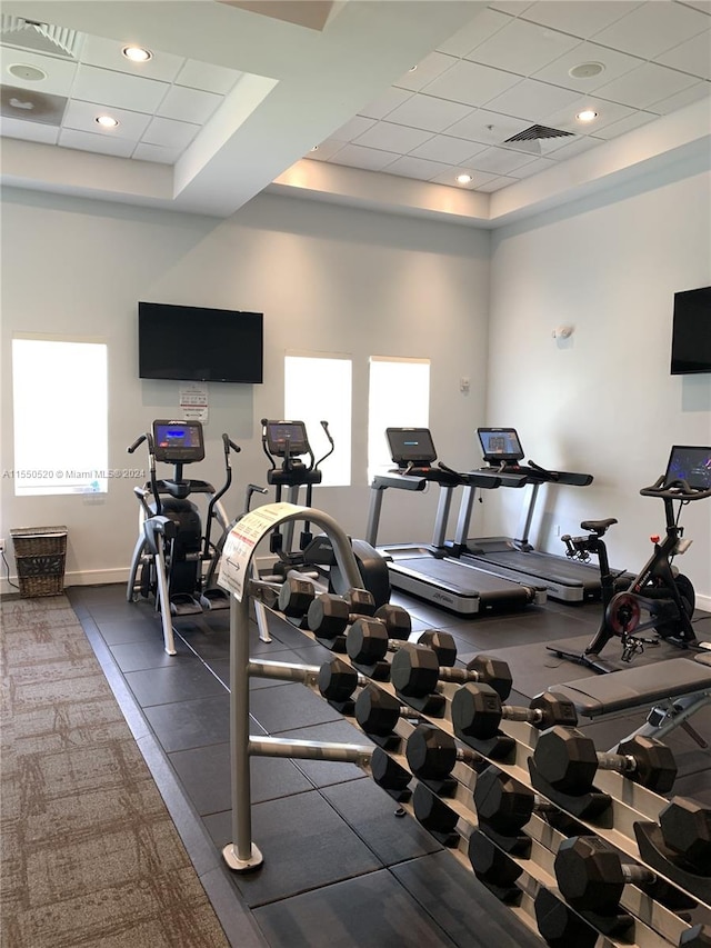 gym featuring a drop ceiling