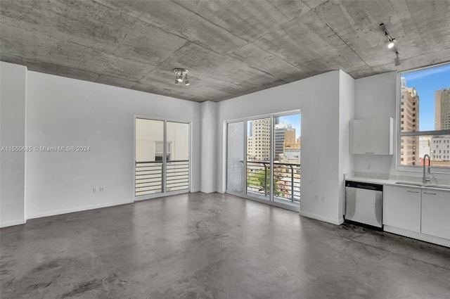 interior space featuring concrete flooring and sink