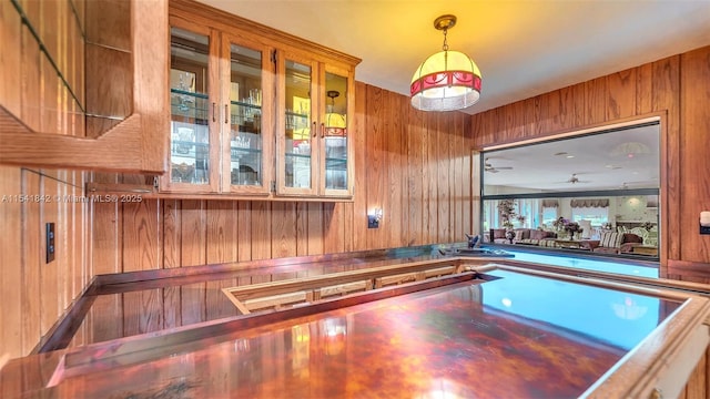 interior space featuring wood walls