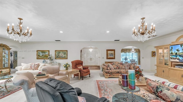 living room featuring light carpet, an inviting chandelier, and ornamental molding