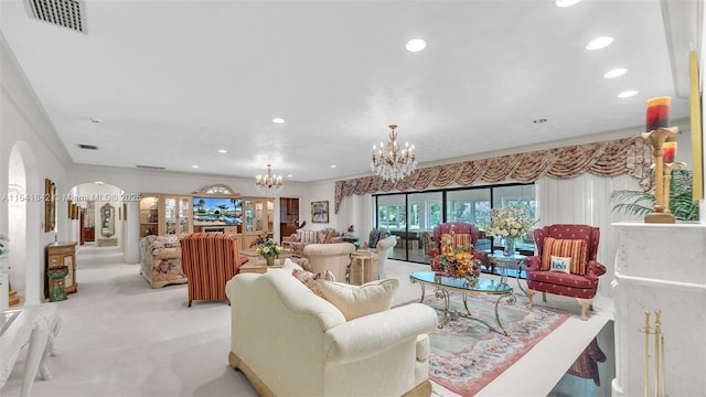 carpeted living room with a chandelier and ornamental molding