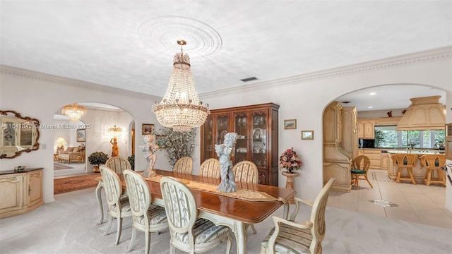 carpeted dining space featuring crown molding and a notable chandelier