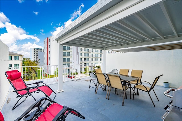 view of patio with a balcony