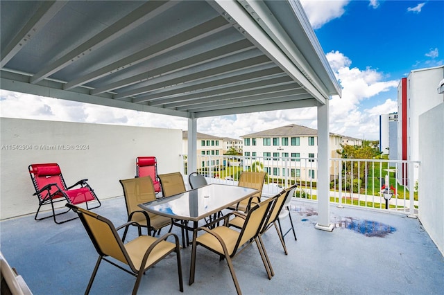 view of patio with a balcony