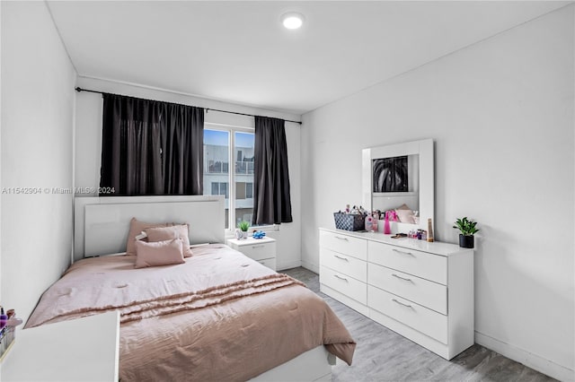 bedroom featuring light wood-type flooring