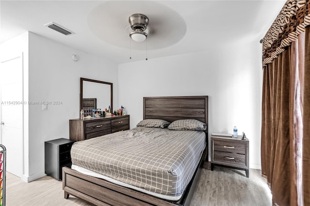 bedroom featuring ceiling fan and light wood-type flooring