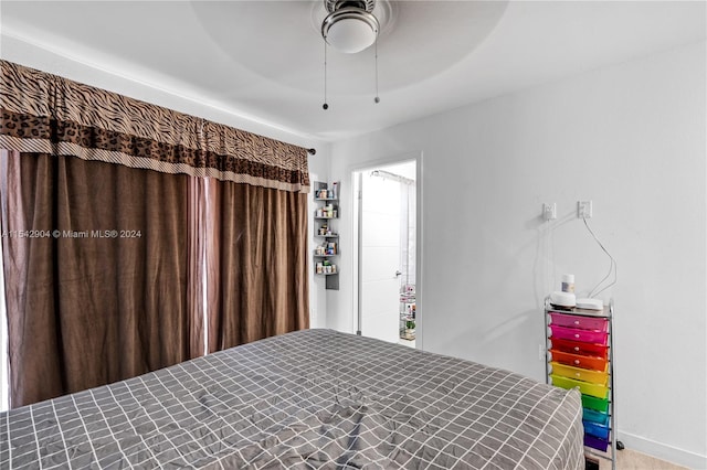 unfurnished bedroom featuring ceiling fan