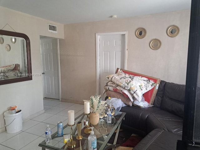 living room with light tile patterned floors