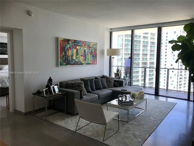 living room with floor to ceiling windows