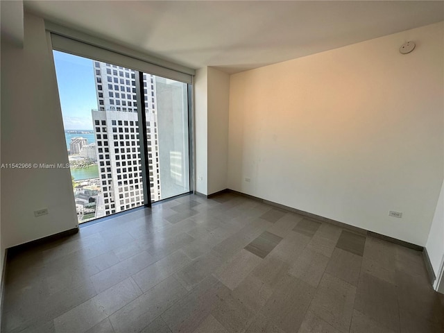 empty room with floor to ceiling windows