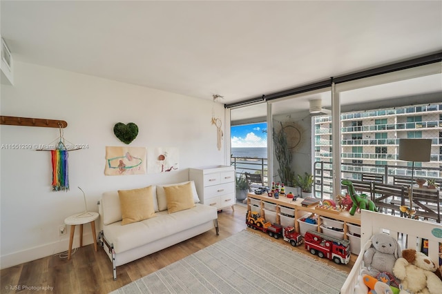 living area featuring hardwood / wood-style floors