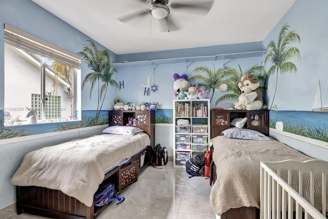 bedroom with light tile flooring and ceiling fan