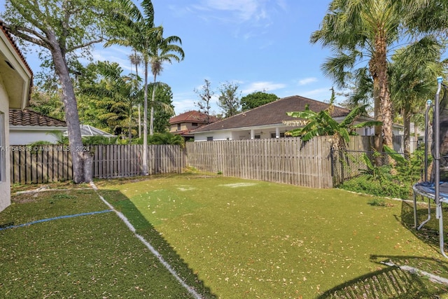 view of yard featuring a trampoline