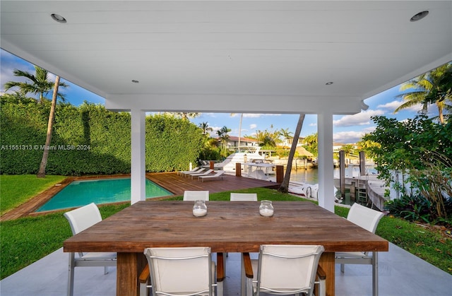 view of patio featuring a water view