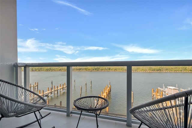 balcony featuring a water view