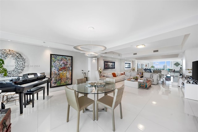 dining room with light tile flooring