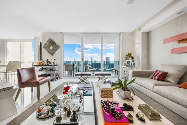 living room with expansive windows and a wealth of natural light