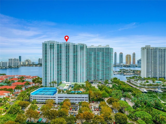 birds eye view of property featuring a water view