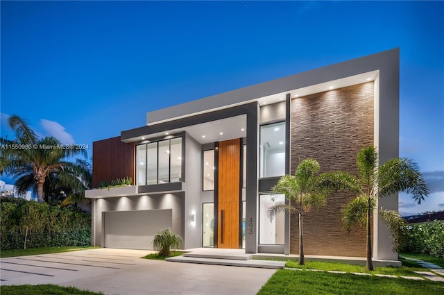 contemporary house featuring a garage