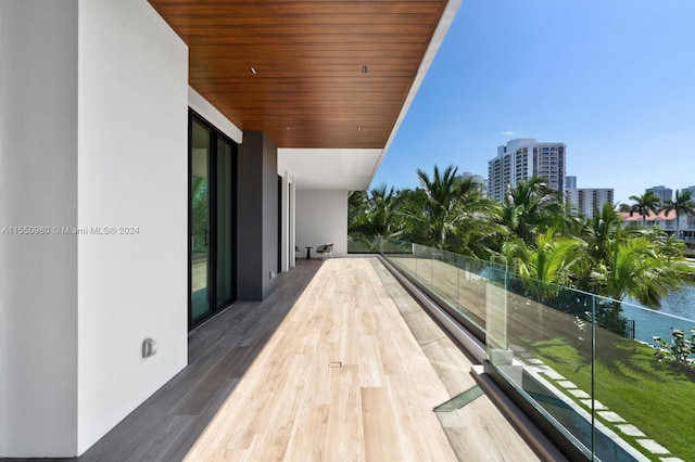 balcony featuring a water view