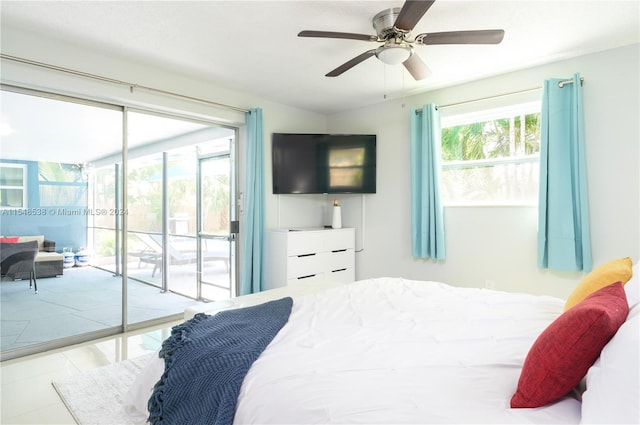 bedroom with light tile floors, ceiling fan, and access to outside