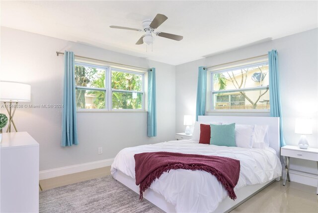 bedroom featuring ceiling fan and light wood-type flooring