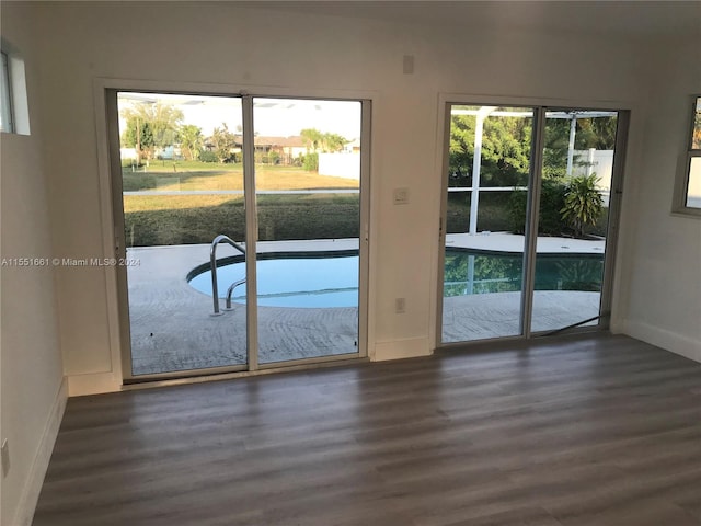 interior space with dark hardwood / wood-style flooring