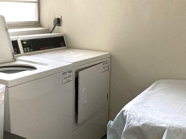 laundry area featuring hookup for an electric dryer and washer and dryer