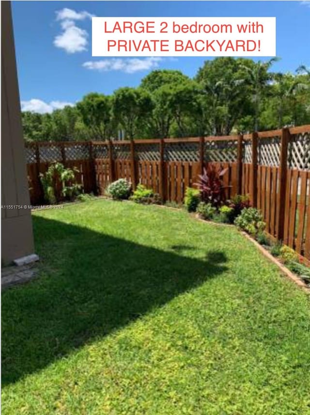 view of yard featuring a fenced backyard