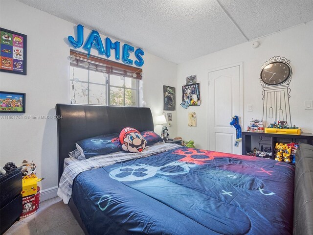 bedroom with a textured ceiling