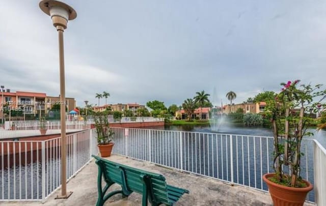 exterior space with a water view