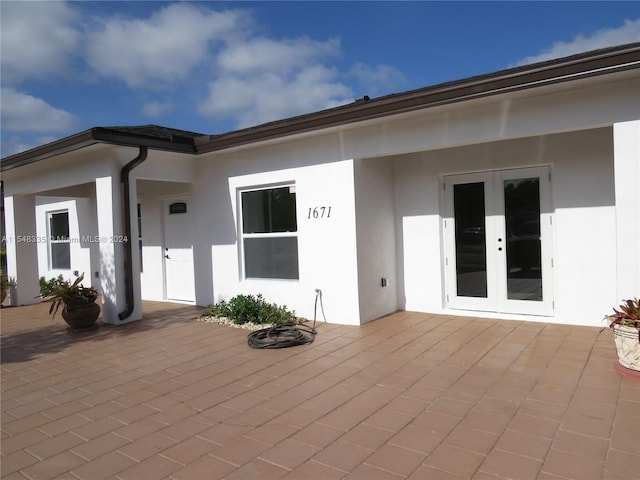 exterior space with a patio area and french doors