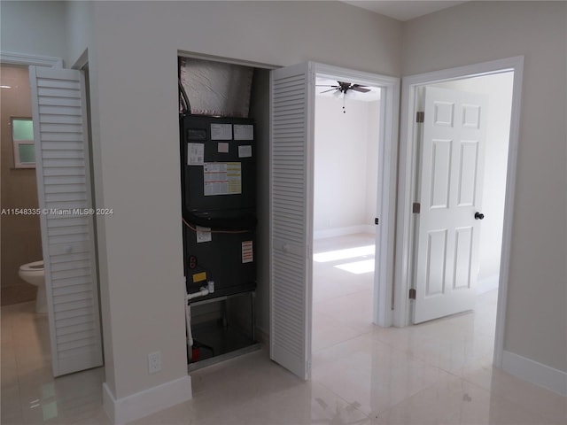 corridor with light tile floors