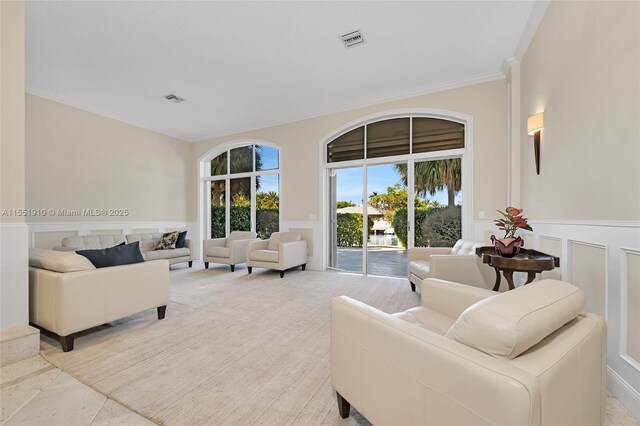 living room with ornamental molding