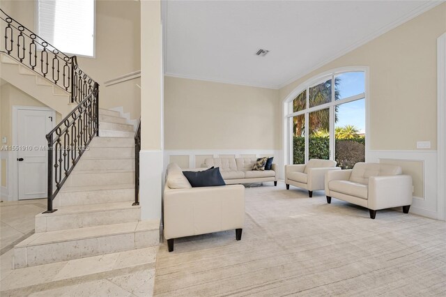 living room featuring crown molding