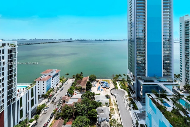 birds eye view of property featuring a water view