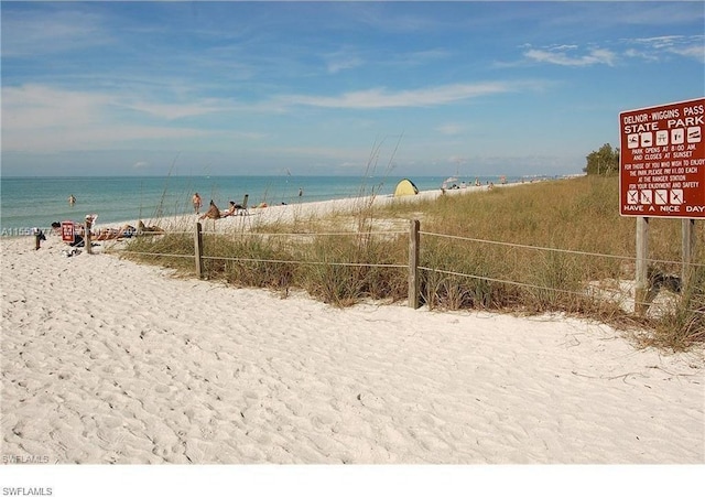 property view of water featuring a view of the beach