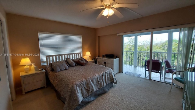 bedroom with ceiling fan, access to exterior, and carpet floors