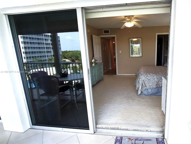 carpeted bedroom featuring ceiling fan