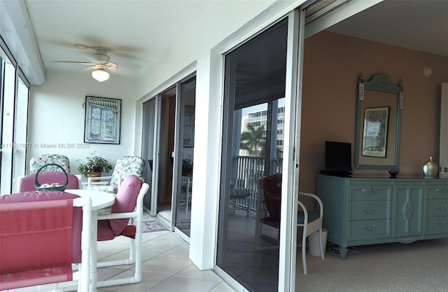 interior space featuring ceiling fan