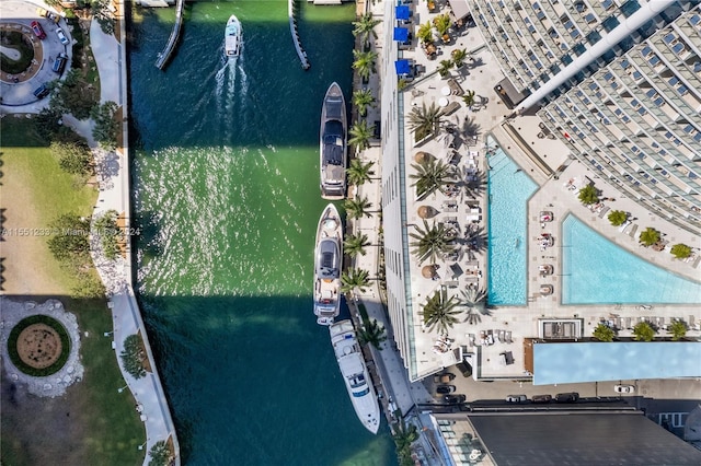 birds eye view of property featuring a water view