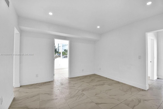 view of tiled spare room