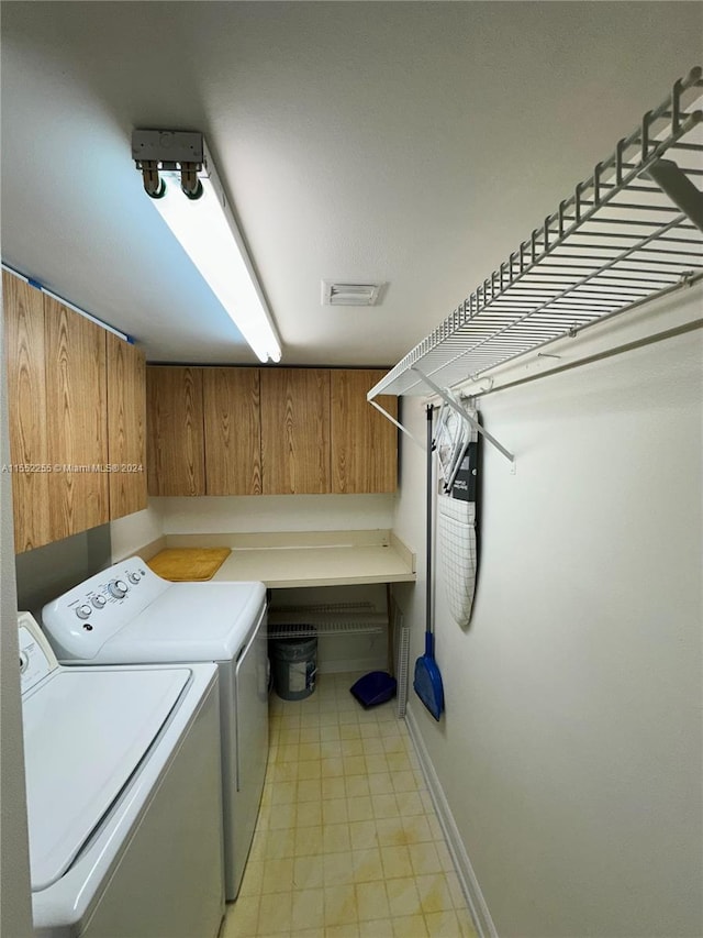 laundry room with washer and clothes dryer