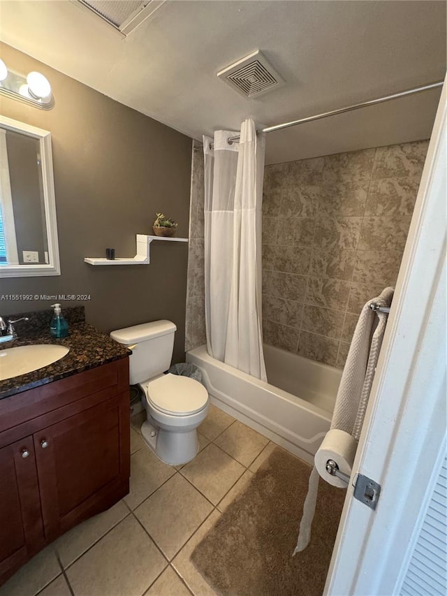 full bathroom featuring shower / bath combo, toilet, tile floors, and vanity