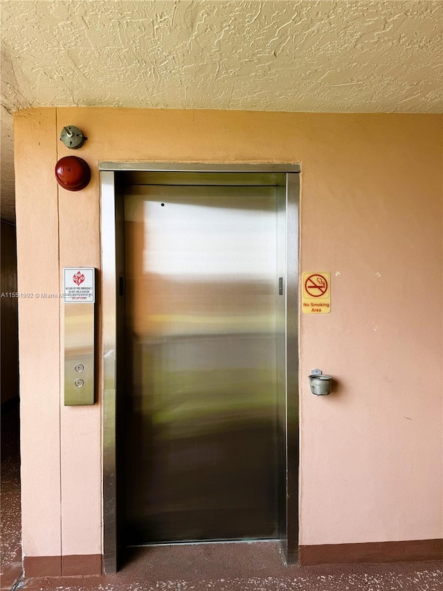 property entrance featuring elevator