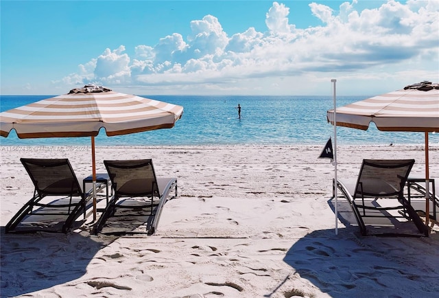 view of water feature featuring a beach view