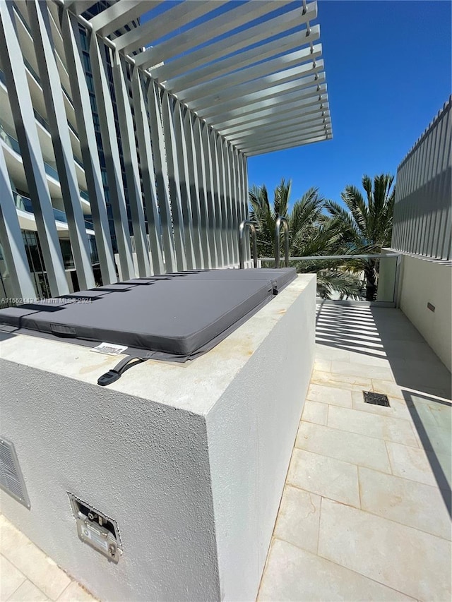 view of patio / terrace featuring a balcony