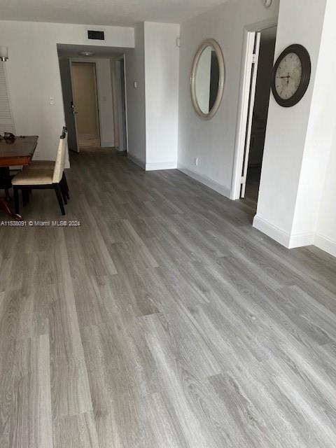 interior space with dark wood-type flooring